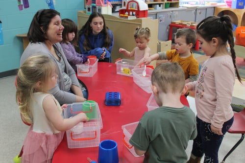 children experimenting in their classroom