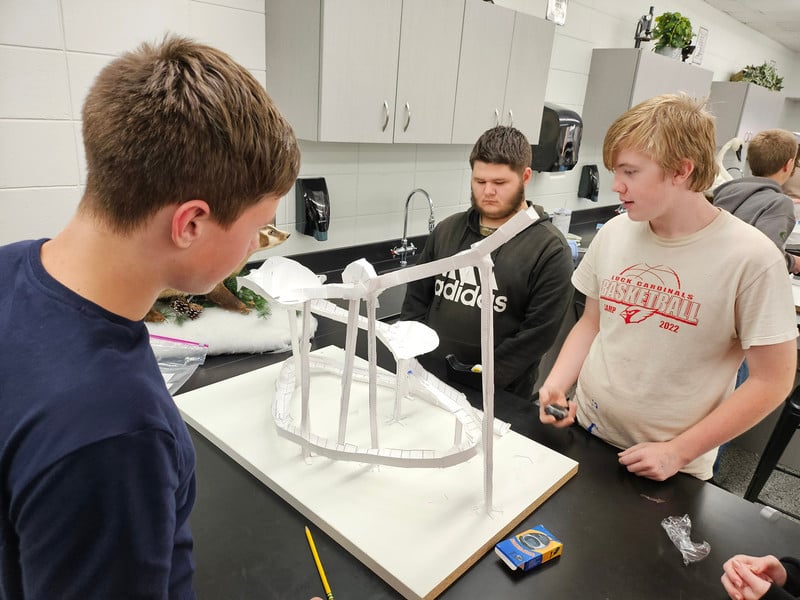 middle school students working on a project